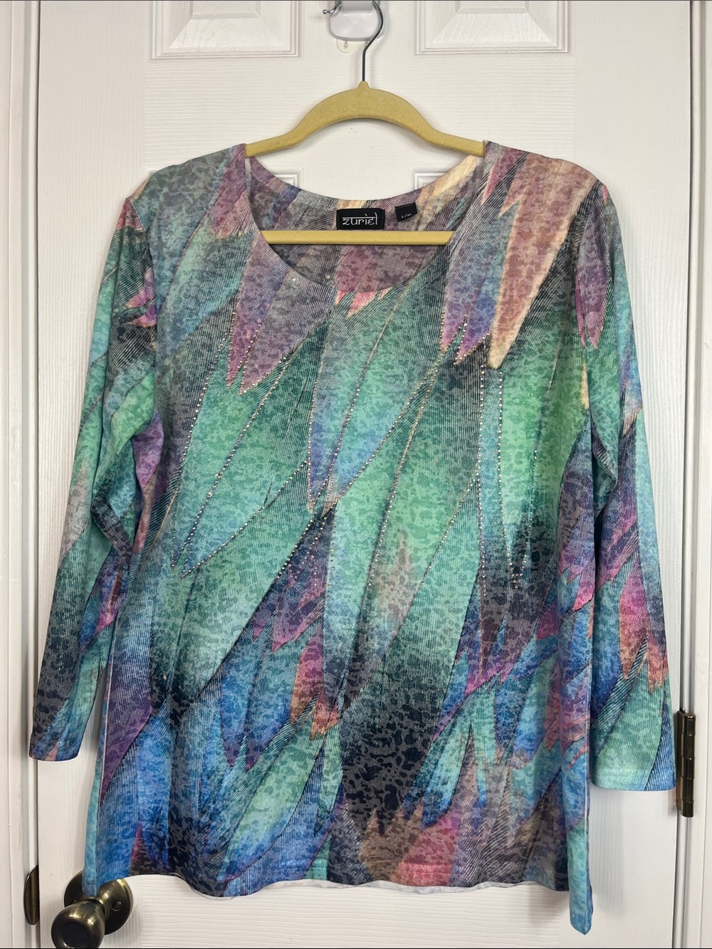 Zuriel pastel colored 3/4 length sleeves top size l/xl. Beading.